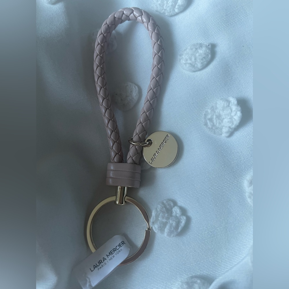 Laura Mercier Keychain with Pink and Gold Accents